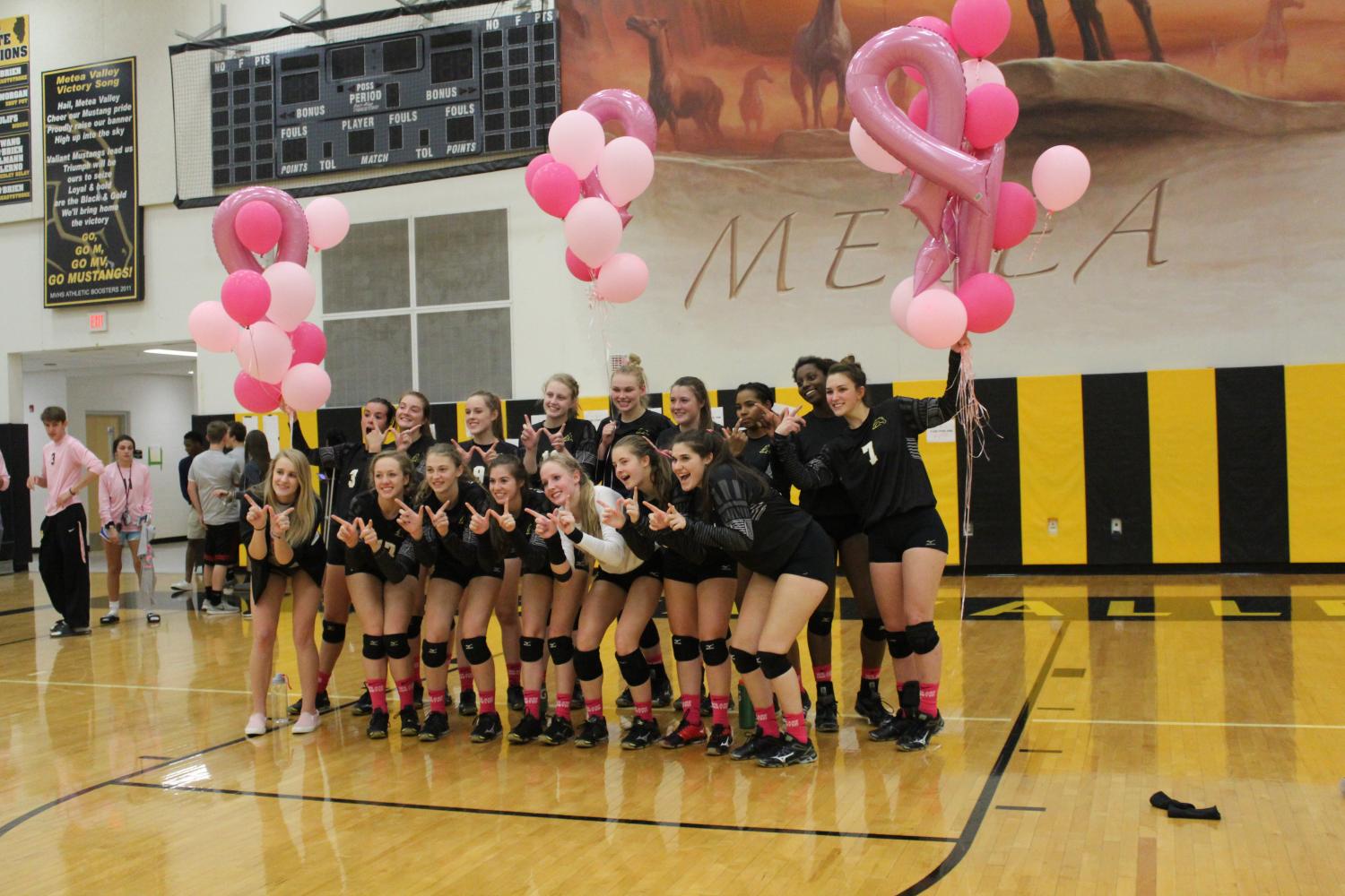 Girls Volleyball plays in honor of breast cancer