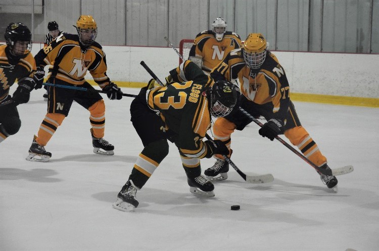 Senior Jack Flood off a face-off on Sunday night. He scored to make it 3-1 in the second period.