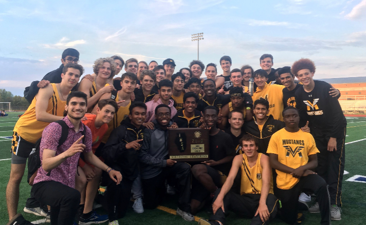The+varsity+boys+track+and+field+team+with+the+sectional+plaque+last+Thursday.