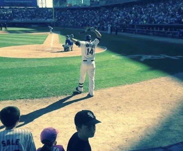 Former first basemen Paul Konerko warming up to bat for the last time in his career against the Royals