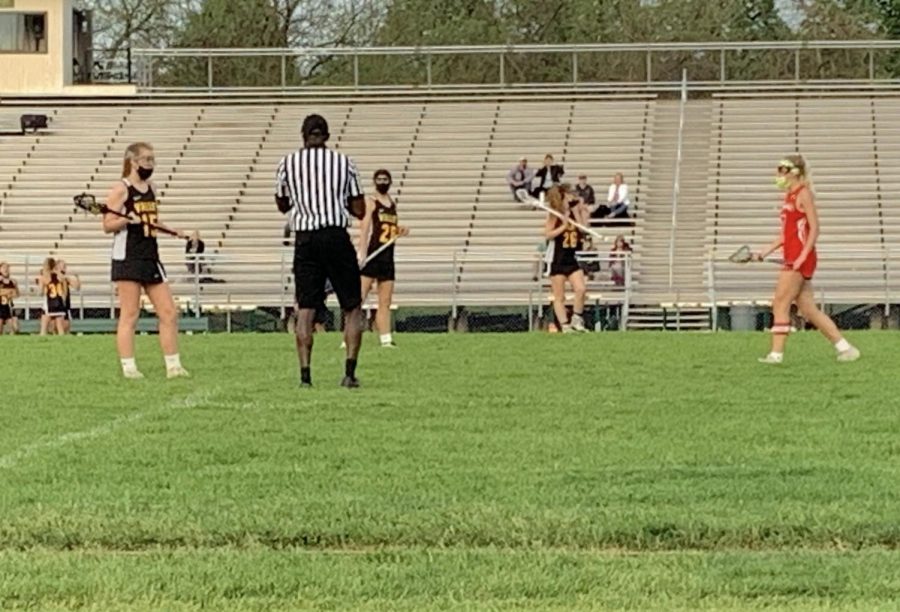 The girls lacrosse team wins against Naperville Central convincingly, 19-8.