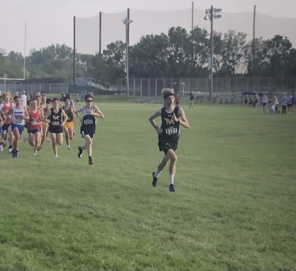  Senior Ben Lamsma taking off from the starting line at the Aurora City Meet. 