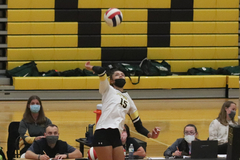 Kira Hutson jumps for a spike during volleyball game against Waubonsie Valley last Tuesday.