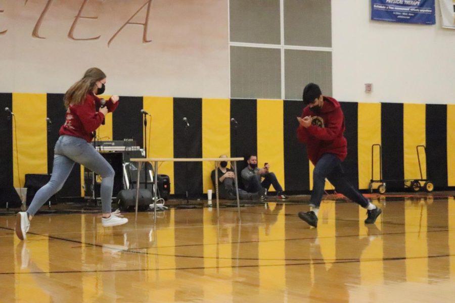 Seniors Lauren Verthein and Saish Pothina perform a comedy skit that they performed during their prior speech tournaments. The skit is a satire about modern relationships. 