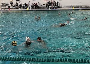 The Mustangs host Schaumburg for a girls water polo game.
