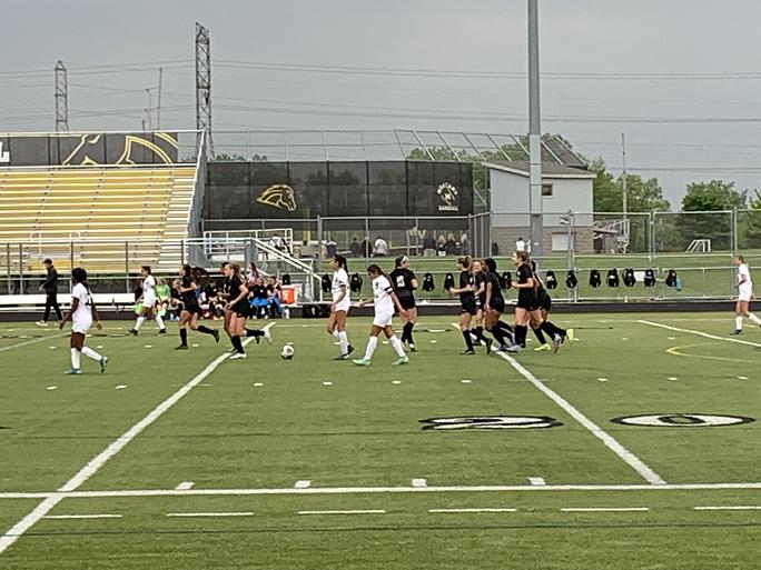 The+girls%E2%80%99+soccer+team+celebrates+after+a+goal+by+Tyra+King+to+give+the+Mustangs+a+3-0+lead+in+Tuesday%E2%80%99s+5-0+win+against+West+Aurora.