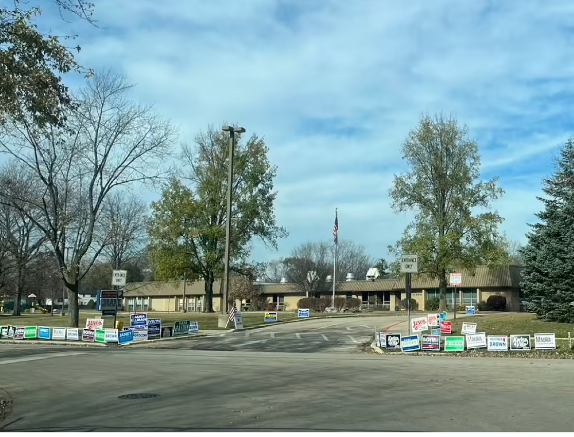 Voters cast their ballots in public polling stations.
