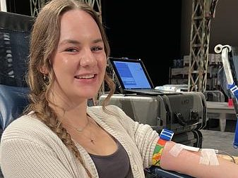 A student gets their blood drawn at a drive hosted by the Aspiring Health Professionals.