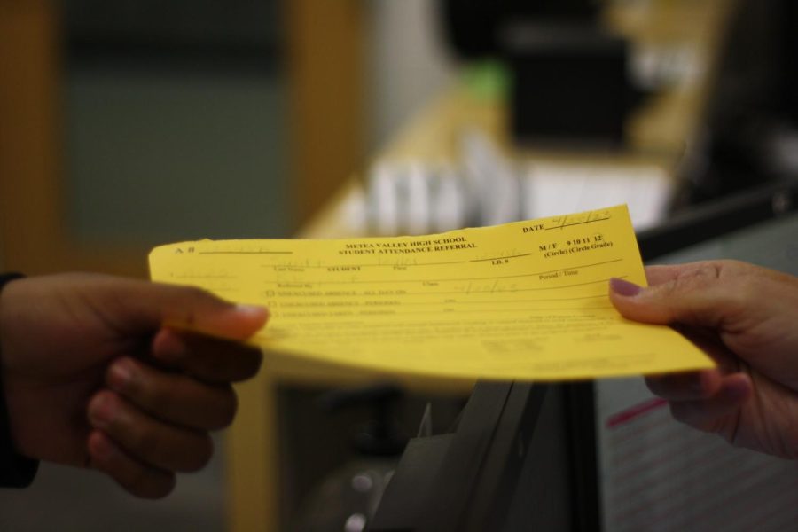 A yellow referral slip indicates a consequence for student behavior, including a possible in-school suspension. 