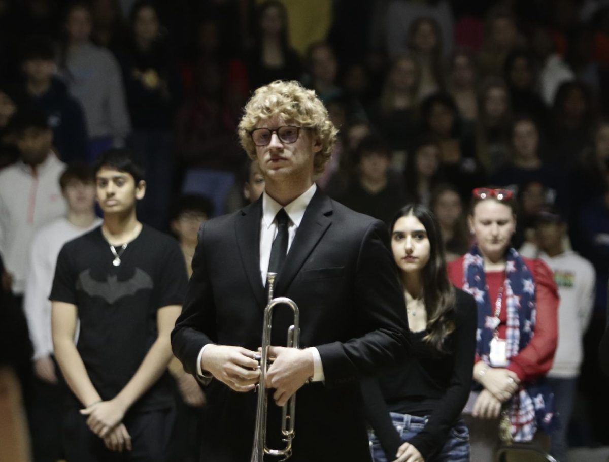 Joe McCoy plays the trumpet at the Veterans Day assembly on Nov. 10, 2023.