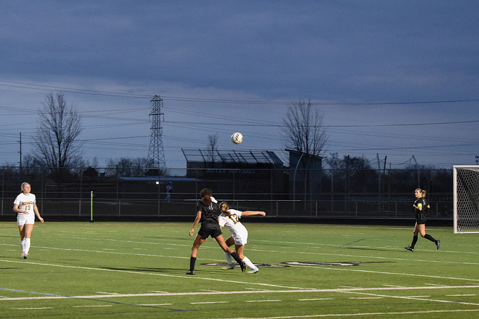 Despite+the+weather%2C+Metea+Valley+girls+soccer+team+still+have+it+their+all+during+the+game.
