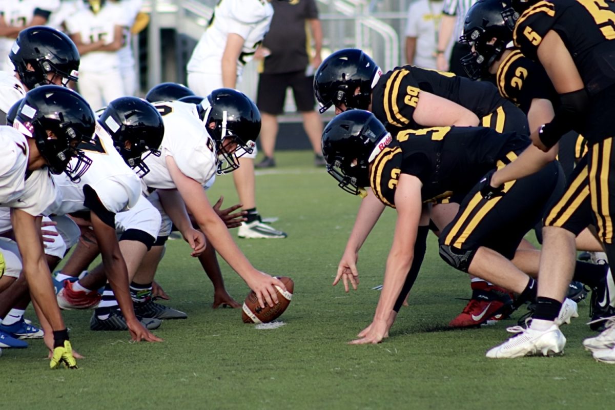 Metea Valley football players prepare for another scrimmage.
