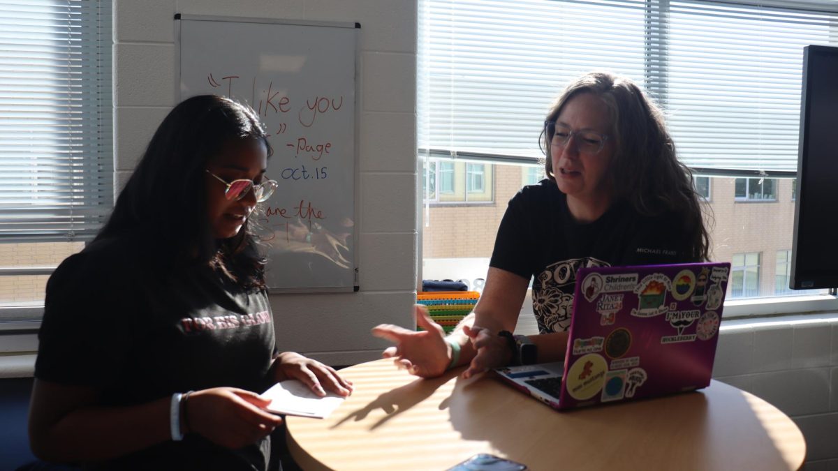 Social Studies teacher Mary Anne Zears shadowing Dhiya Ashlyn for teacher shadowing student program.