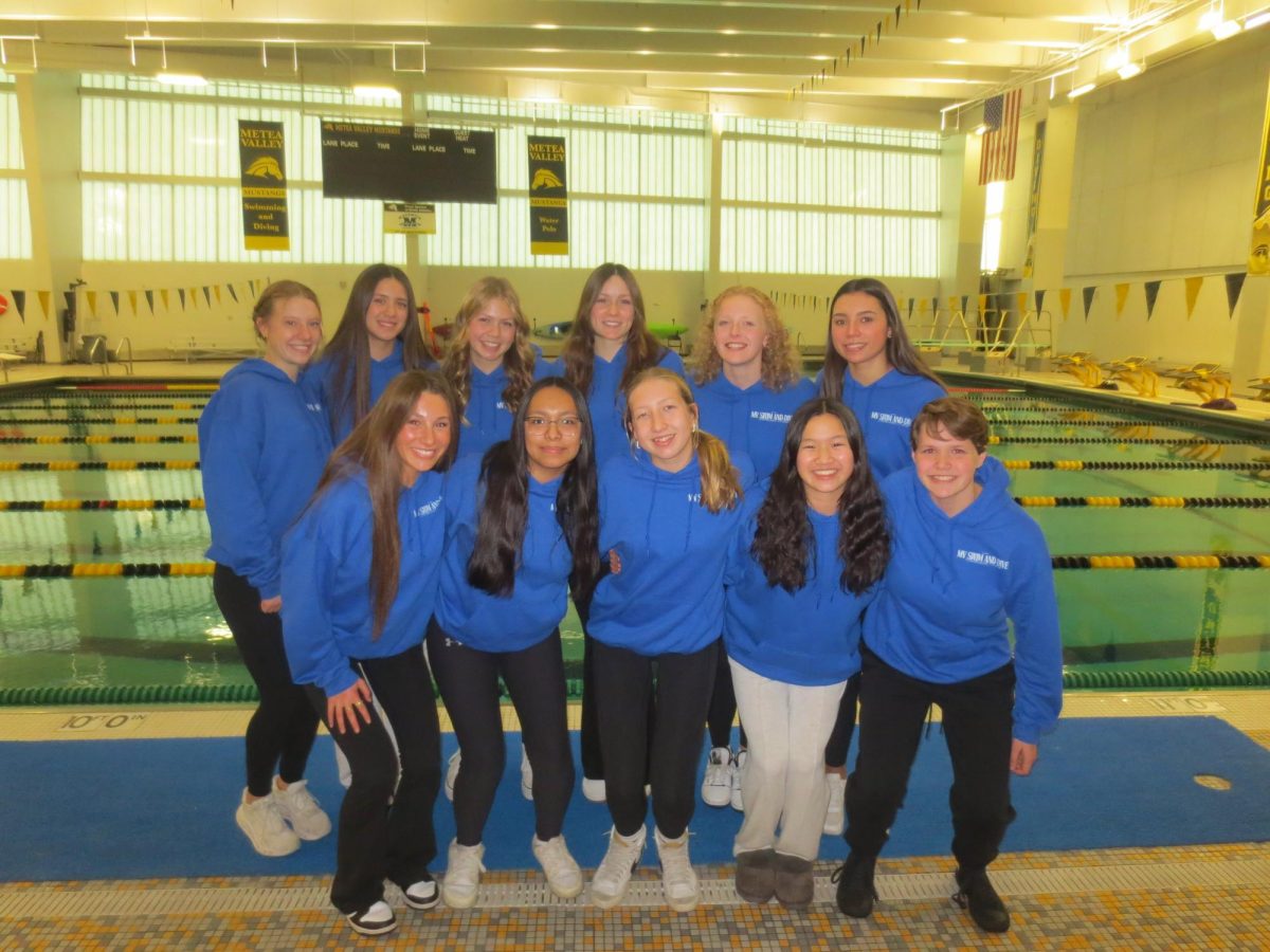 Girl swimming and diving host the 2024 sectionals, where senior Bridget Anderson and junior Molly Schalk qualified for state.