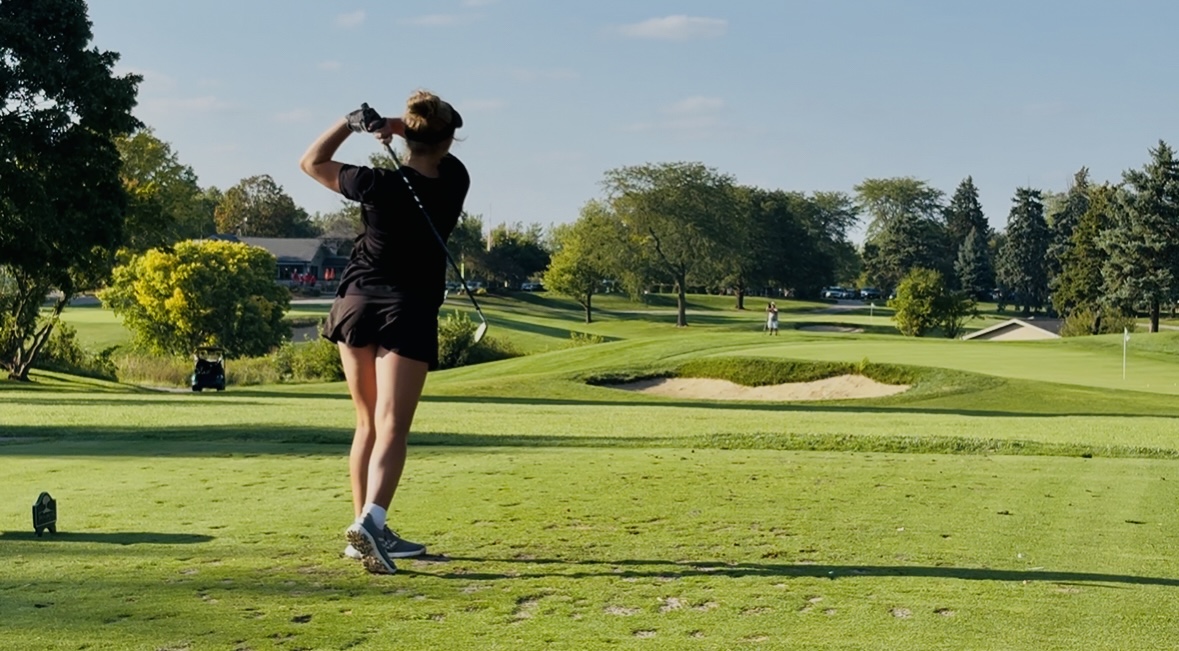 Senior Mckenna Wigfield tees off.