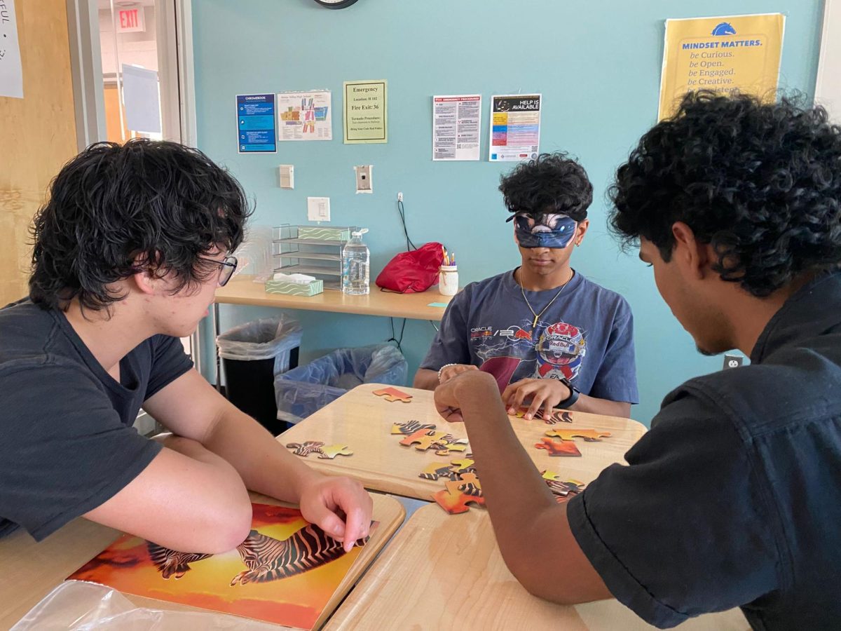 Students dive into the first week of school with teamwork icebreakers, piecing together puzzles and new friendships during activities designed to spark connection and collaboration.
