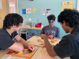 Students dive into the first week of school with teamwork icebreakers, piecing together puzzles and new friendships during activities designed to spark connection and collaboration.
