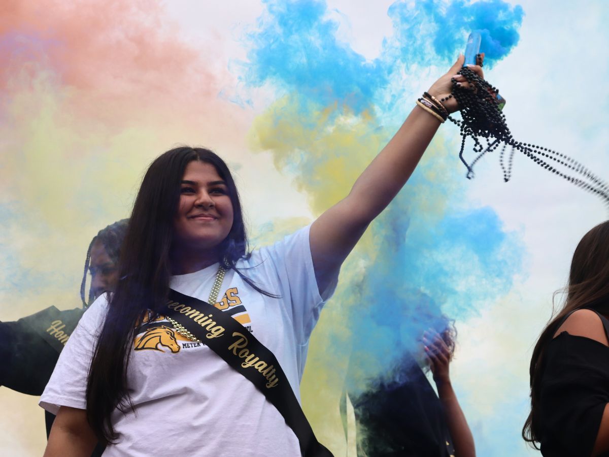 Freshman Zoya Qureshi celebrates after winning homecoming royalty, and is a queen of the freshman.
