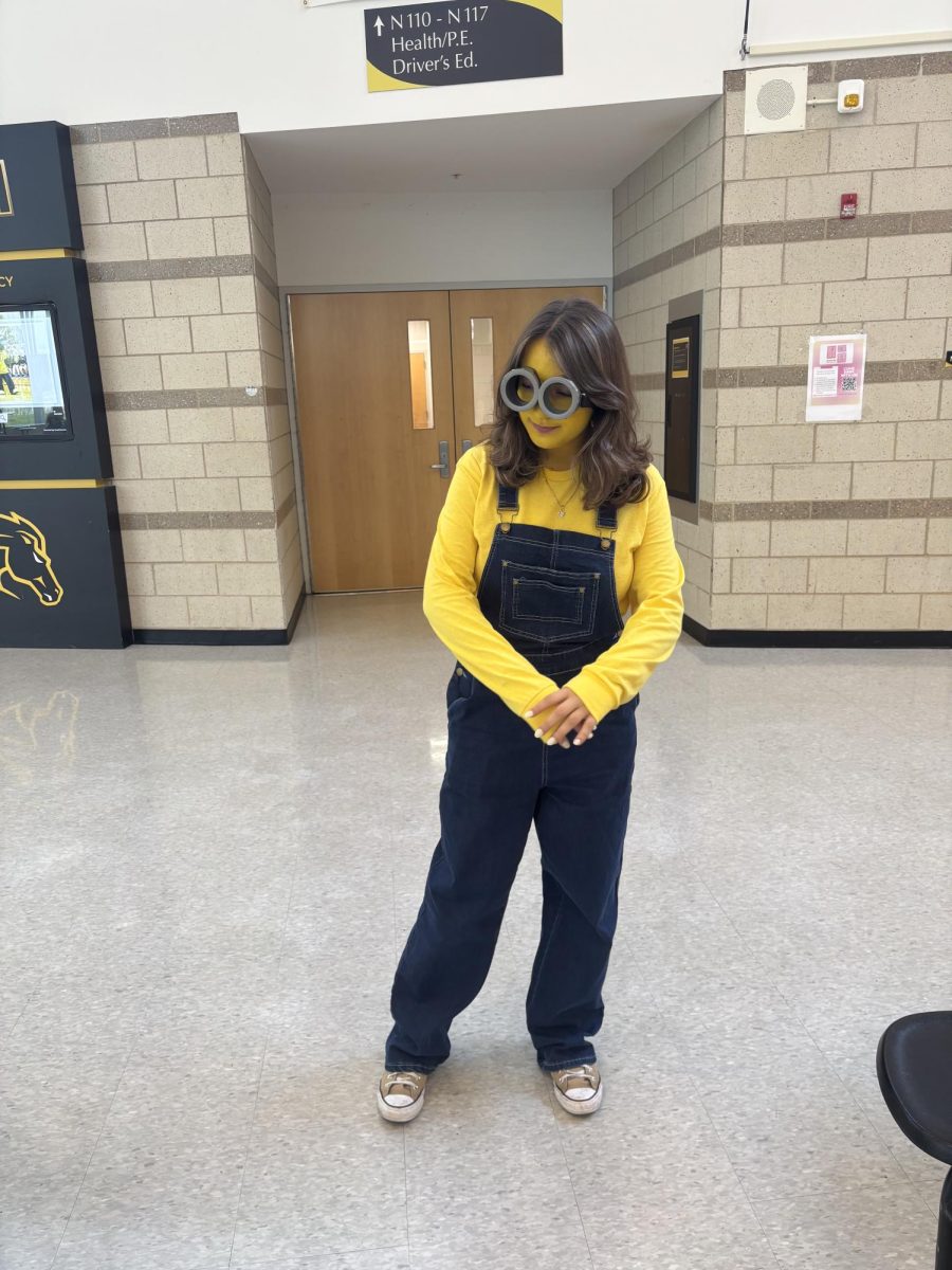 Senior Sofiia Chapovenko dresses up as a yellow minion to display school spirit.