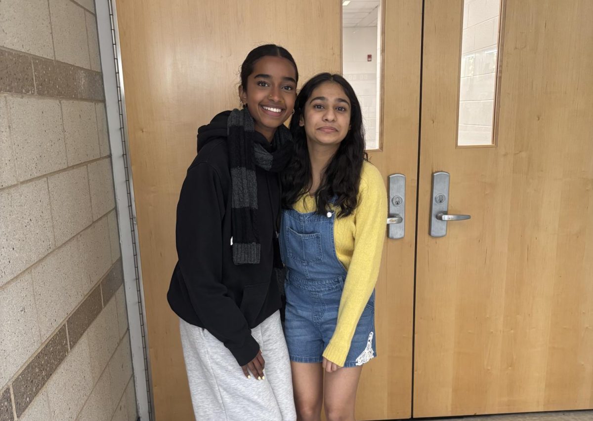 For minion day, juniors Bodvita Rebba and Ziya Bahrainwala dress up as Gru and the yellow minion for homecoming spirit week.