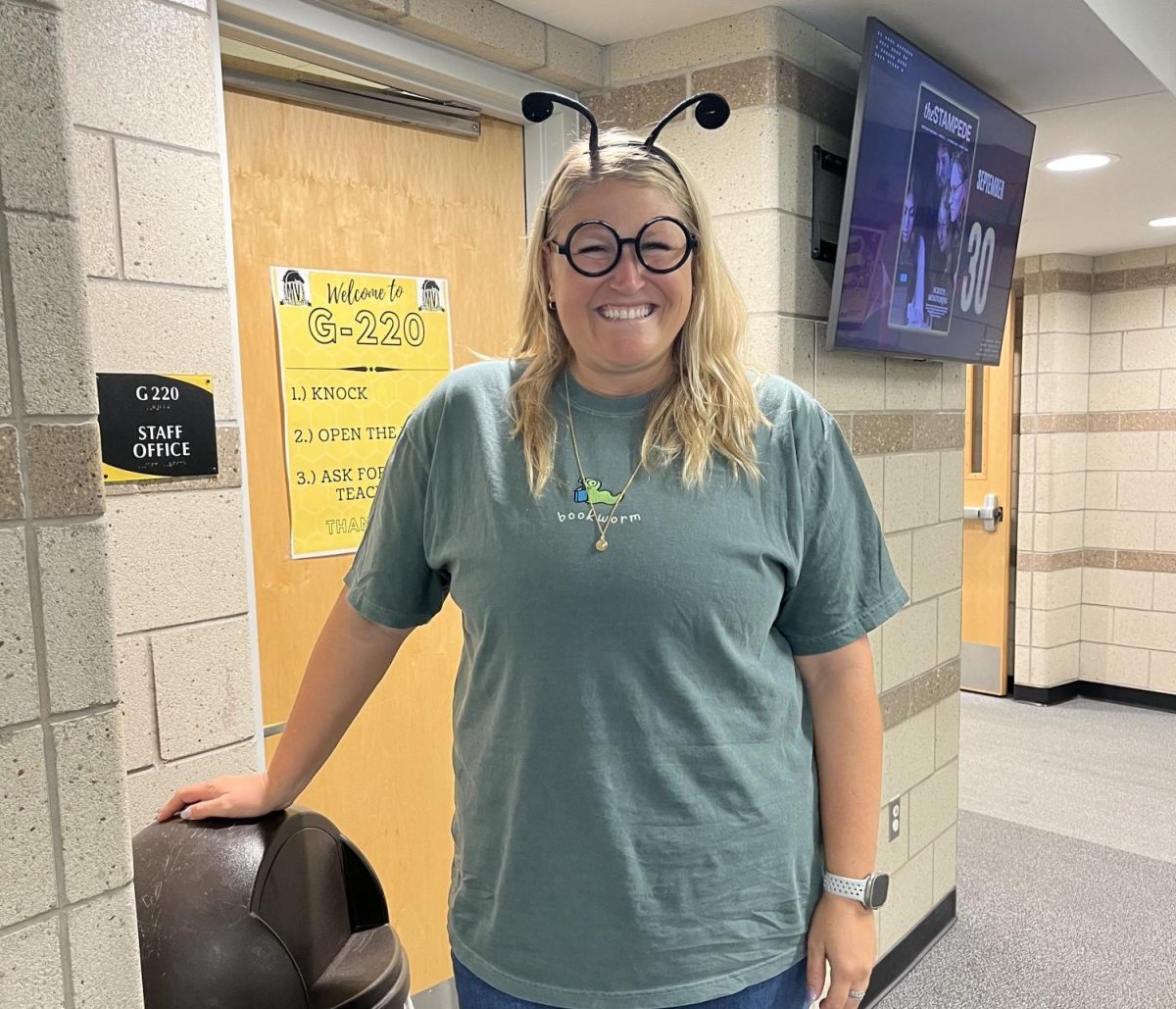 English teacher Rachel Bostick matches with the English department as bookworms for twin day.