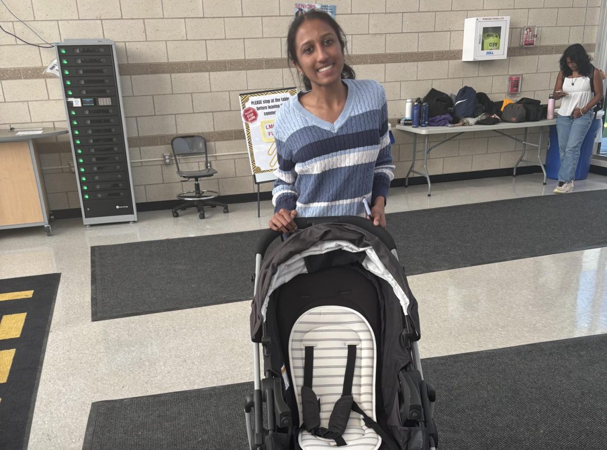 Junior Prisha Singhal brings a stroller to participate in spirit day.