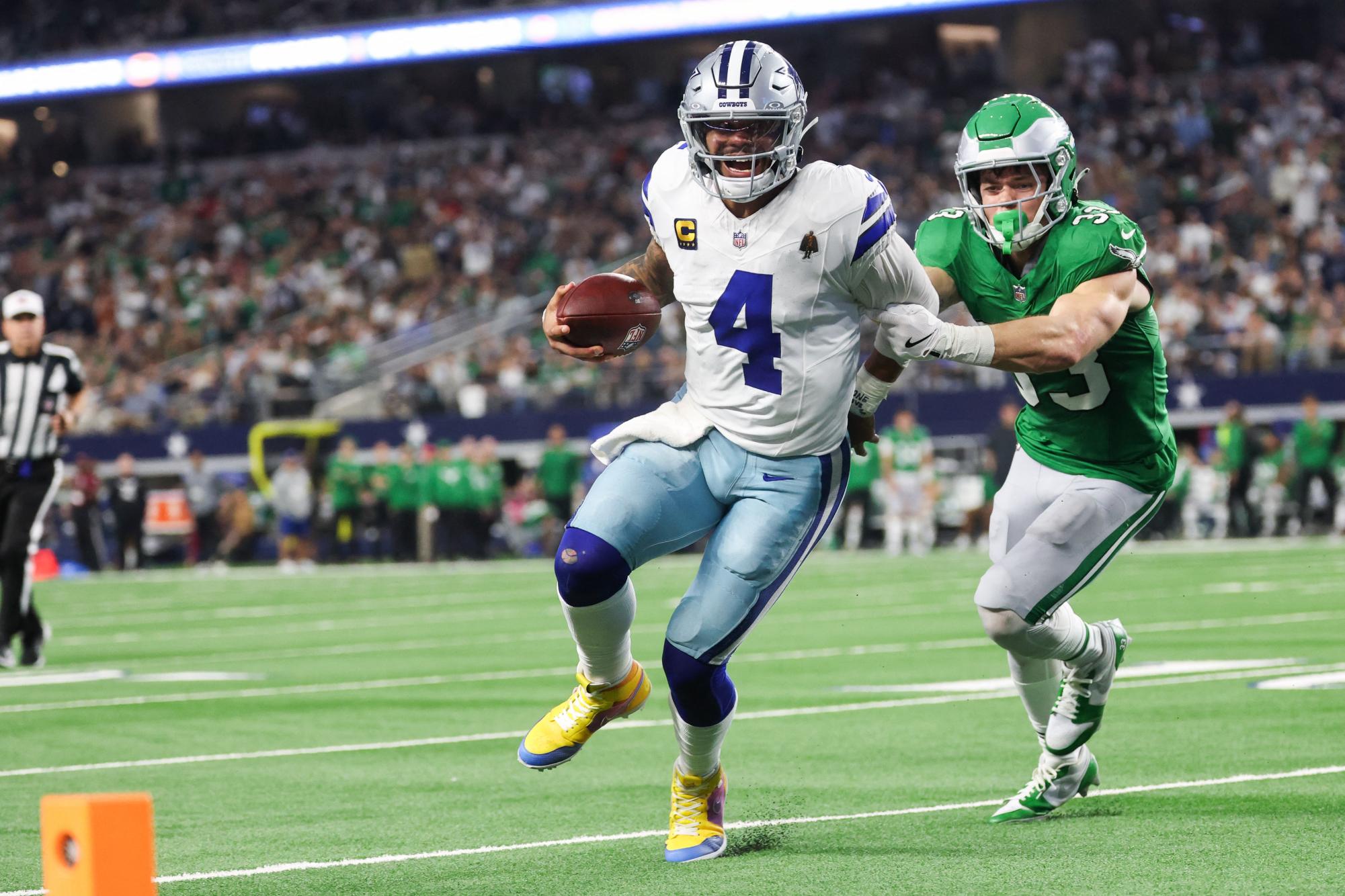 Nov 23, 2025; Arlington, Texas, USA; Dallas Cowboys quarterback Dak Prescott (4) runs with the ball in attempt to score a touchdown in the fourth quarter against the Philadelphia Eagles at AT&T Stadium. Mandatory Credit: Kevin Jairaj-Imagn Images