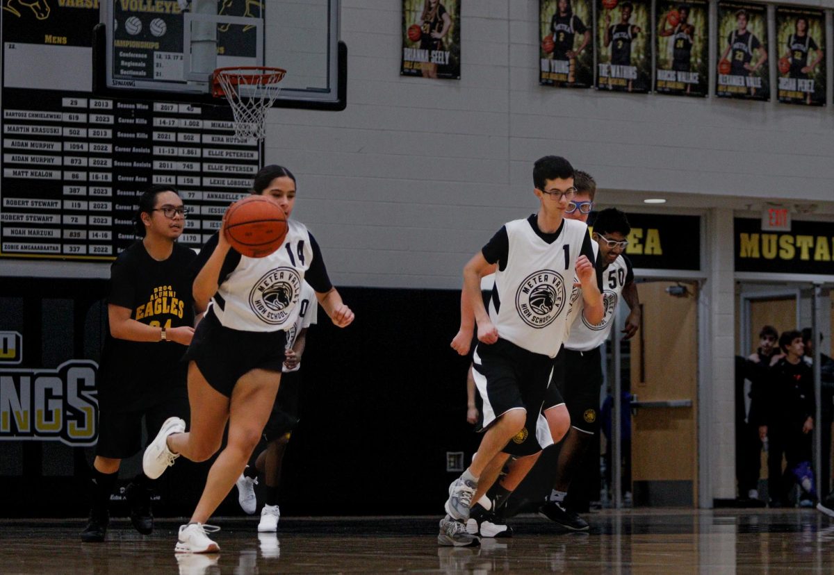 Mustangs move full speed to attack the Eagles.